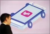  ?? PATRICK T. FALLON — BLOOMBERG NEWS ?? Lyft, which is the No. 2U.S. ride-hailing giant, is offering 30.8million shares at $62to $68each, the company said in a regulatory filing Monday.