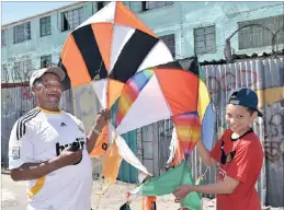  ?? PICTURE: JASON BOUD ?? Orion Brody, 13, and his grandfathe­r, Gerald Gelderbloe­m, from Parkwood, have been making and flying kites together for more than five years. Gerald makes the kites out of bamboo and pieces of old umbrellas.