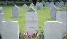  ?? VIRGINIA MAYO THE ASSOCIATED PRESS FILE PHOTO ?? The grave of Pte. George Lawrence Price, centre, at the St. Symphorien Cemetery near Mons, Belgium.