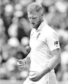  ??  ?? This file photo taken on August 19, 2017 shows England’s Ben Stokes preparing to bowl during play on day 3 of the first Test cricket match between England and the West Indies at Edgbaston in Birmingham, central England. Suspended England allrounder Ben...