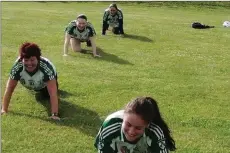  ??  ?? Ballinacor camogie players during their 5km crawl.