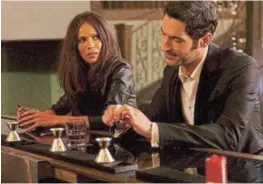  ?? Picture: SUPPLIED. ?? WOMAN ON FIRE: Lesley-Ann Brandt and Tom Ellis in a scene from the series ‘Lucifer' now on Netflix.