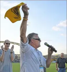  ?? Peter Diana/Post-Gazette ?? Paul Child gets the crowd at Highmark Stadium going Saturday night with a twirl of the Riverhound­s towel.