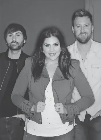  ?? MARK HUMPHREY/THE ASSOCIATED PRESS ?? The members of Lady Antebellum include Dave Haywood, left, Hillary Scott, and Charles Kelley. The country trio’s latest record Heart Break arrives after a two-year hiatus.