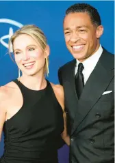  ?? CHARLES SYKES/INVISION 2022 ?? The romance between anchors Amy Robach and T. J. Holmes was revealed in November.