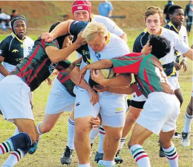  ?? Picture: CELESTE ROWE ?? HEAD DOWN: Westering prop Reece Caires drives with the ball while teammates, from the left, Thabang Boyce, Ryan Rowe, Wesley Anderson and Kamvi Ntebe follow in support