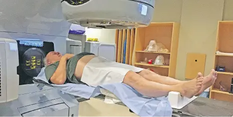  ??  ?? Vancouver Sun reporter Larry Pynn receives external beam radiation treatment for prostate cancer at a B.C. Cancer Agency clinic.