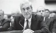  ?? SAUL LOEB/GETTY ?? Former special counsel Robert Mueller testifies before Congress on Wednesday in Washington, D.C.