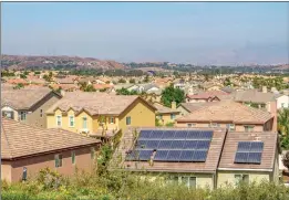  ?? Austin Dave/The Signal ?? California became the first state in the country to require solar panels on all new homes built. According to the California Energy Commission, starting in 2020, the panels will be a standard feature in a new house.