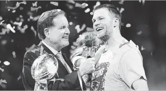  ?? JAMIE SQUIRE GETTY IMAGES ?? Jim Nantz interviews Tom Brady after the Patriots defeated the Los Angeles Rams 13-3 at Super Bowl LIII. This week, Nantz is in the broadcast booth with Nick Faldo at the Pebble Beach Pro-Am.