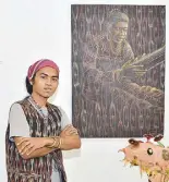  ??  ?? “Tugtog ni Lola” by Sarangani artist Ronald Tamfalan highlights his T’boli roots.