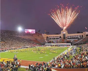  ?? MARK J. TERRILL AP ?? USC and UCLA will now play national games every weekend in football and basketball by joining the Big Ten.