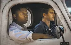  ?? Steve Dietl / Netflix ?? Jason Mitchell (left) and Garrett Hedlund in “Mudbound,” directed by Dee Rees.
