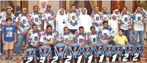  ??  ?? Zain officials with the Kuwait national jet ski team at the airport.