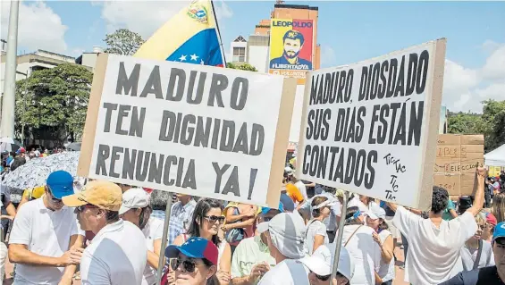  ?? EFE ?? Protestas. La oposición volvió a salir a la calle este fin de semana contra el gobierno de Maduro y por la realizació­n de comicios nacionales.