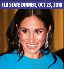  ??  ?? FIRST OUTING: The Duchess wears the earrings in Fiji