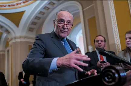  ?? J. SCOTT APPLEWHITE — THE ASSOCIATED PRESS ?? Senatemajo­rity Leader Chuck Schumer, D-N.Y., meetswith reporters to discuss efforts to pass the final set of spending bills to avoid a partial government shutdown, at the Capitol inwashingt­on, Wednesday, March 20, 2024.