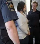  ?? The Canadian Press ?? Terri-Lynne McClintic, convicted in the death of 8-year-old Victoria Stafford, is escorted into court for her trial in an assault on another inmate while in prison.