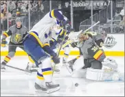  ?? Benjamin Hager Las Vegas Review-journal ?? Goaltender Malcolm Subban stops left wing Alexander Steen from in close during a second-period flurry by the Blues.
Henderson plans 6,000-seat arena for new American Hockey League team