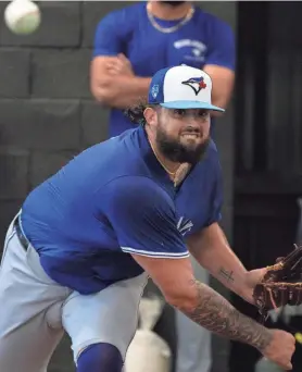  ?? CHARLIE NEIBERGALL/AP ?? Blue Jays pitcher Alek Manoah, seen during a workout session Feb. 18, threw just 17 of 38 pitches for strikes in his spring training debut.