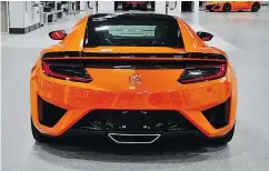  ??  ?? The new NSX is built by hand and machine in Acura’s Performanc­e Manufactur­ing Center in Ohio.