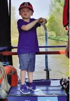  ??  ?? Children love getting hands-on experience on board narrowboat Bluebell.
