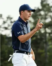  ?? AFP ?? Jordan Spieth reacts on the 18th green of the Masters Tournament first round at Augusta National Golf Club on Thursday. —