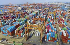  ??  ?? Manila Internatio­nal Container Terminal (MICT), ICTSI’s flagship operations at the Port of Manila