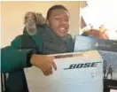  ?? COURTESY ?? Lamar Leslie-Allen, 15, was fatally shot Saturday night, Baltimore County Police said. He’s pictured at Christmas showing off a new PlayStatio­n.