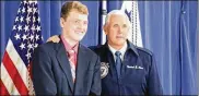  ?? TODD JACKSON / STAFF ?? Vice President Mike Pence met with West Liberty-Salem High School student Logan Cole after Pence spoke to C-17 air crew members at Wright-Patterson Air Force Base Saturday. He was at the base to observe Armed Forces Day.