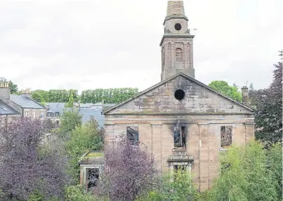  ??  ?? The fire-damaged church building in Lochee accommodat­ed several congregati­ons over the years.
