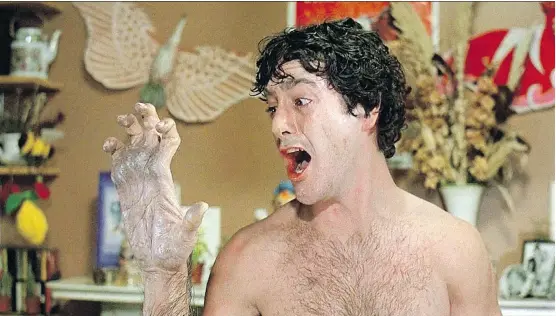  ?? UNIVERSAL PICTURES ?? David Naughton in the iconic transforma­tion scene of An American Werewolf in London. The film has a dedicated fan base decades later and has become a cult classic.