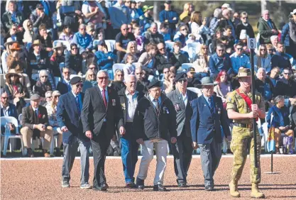  ?? ?? The Veterans’ March led and reviewed by outgoing Governor-general David Hurley during Anzac Day commemorat­ions at the Australian War Memorial in Canberra. Picture: Martin Ollman