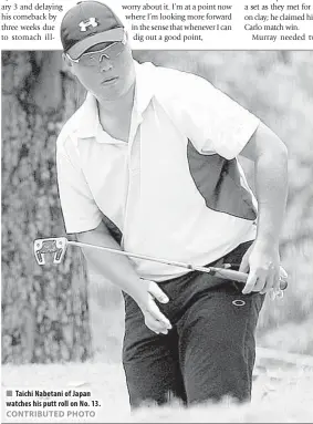  ??  ?? Taichi Nabetani of Japan watches his putt roll on No. 13.