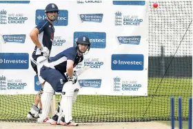  ??  ?? High hopes: Mark Stoneman is put through his paces as Alastair Cook looks on