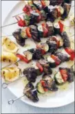  ?? DANIEL J. VAN ACKERE/AMERICA’S TEST KITCHEN VIA ASSOCIATED PRESS ?? This undated photo provided by America’s Test Kitchen shows grilled vegetable kebabs with grilled lemon dressing in Brookline, Mass.