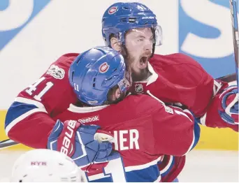  ?? – La Presse canadienne: Ryan Remiorz ?? Paul Byron (41) et Brendan Gallagher.