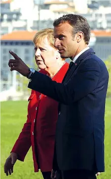  ?? (Epa) ?? A Marsiglia Il presidente francese Macron con la cancellier­a Merkel