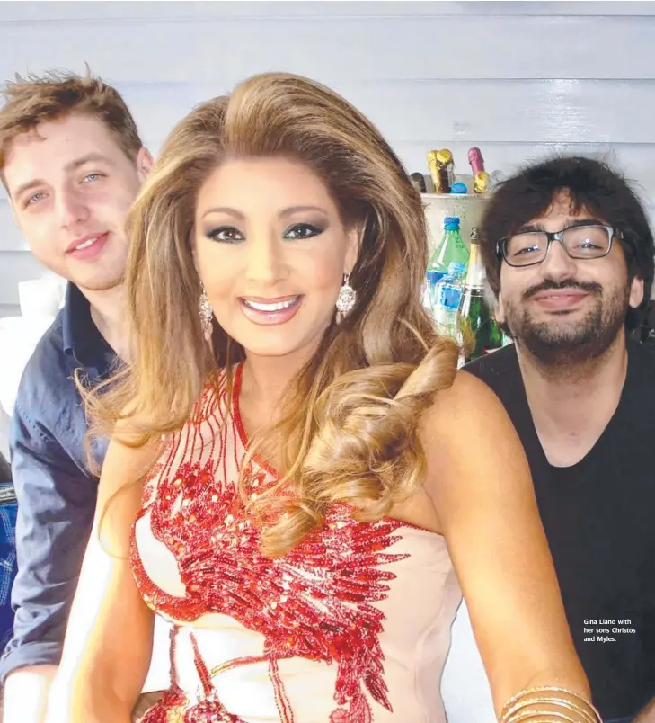  ??  ?? Gina Liano with her sons Christos and Myles.