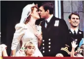  ??  ?? Royal role: the Duchess of York at Prince Harry and Meghan’s wedding in May, above left, 32 years after she married Prince Andrew, above. Below, with daughters Beatrice, left, and Eugenie