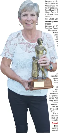  ?? Picture: JON HOUZET ?? BEST SCORE: Debbie Longhurst of the Royal Port Alfred Golf Club ladies’ section received a trophy for best nett score over the course of the year at the end-of-year dinner and Christmas party last week