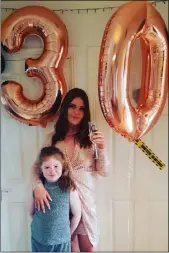  ??  ?? Aoife Moloney spent her 30th birthday celebratin­g at home with daughter Ella.