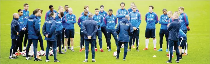  ??  ?? KATWIJK: Dutch national football players attend a training session in Katwijk yesterday. The Netherland­s will face Wales on November 13 and Germany on November 17 in friendly matches. — AFP