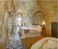  ??  ?? Beautiful cave houses in Matera, Italy, have been transforme­d into the Sextantio Le Grotte Della Civita.