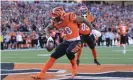  ?? Photograph: Aaron Doster/AP ?? Joe Mixon celebrates one of his two touchdowns on Sunday.