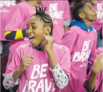  ?? PHOTOS: LYLE ASPINALL ?? The Be Brave dancers, left, hit the ice during the first Be Brave anti-bullying game, a regular-season WHL tilt between the Calgary Hitmen and Brandon Wheat Kings in Calgary Wednesday. More than 8,000 students from Calgary and area were bused to the...