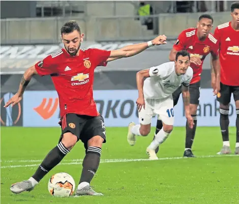  ?? Picture: AP. ?? Bruno Fernandes scores United’s winning goal from the penalty spot.