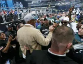  ?? JAE S. LEE/THE DALLAS MORNING NEWS VIA AP ?? Australian rugby player Jordan Mailata shakes hands with fans after he was selected by the Eagles in the seventh round in Arlington, Texas.