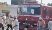  ??  ?? A video grab showing protesters attacking a fire brigade vehicle at Dachar village of Karnal district on Saturday.