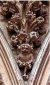  ??  ?? The Lincoln Imp sits wedged between arched stonework in the cathedral, smirking at the congregati­on below.